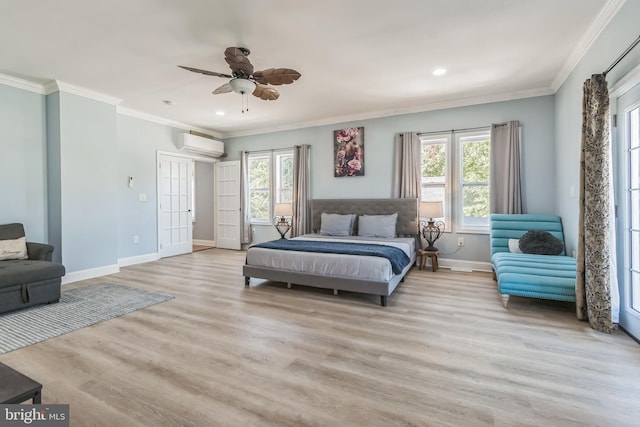 bedroom featuring a wall unit AC, multiple windows, and ceiling fan