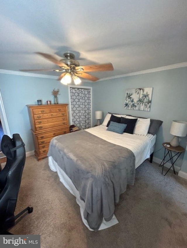 carpeted bedroom featuring ornamental molding and ceiling fan