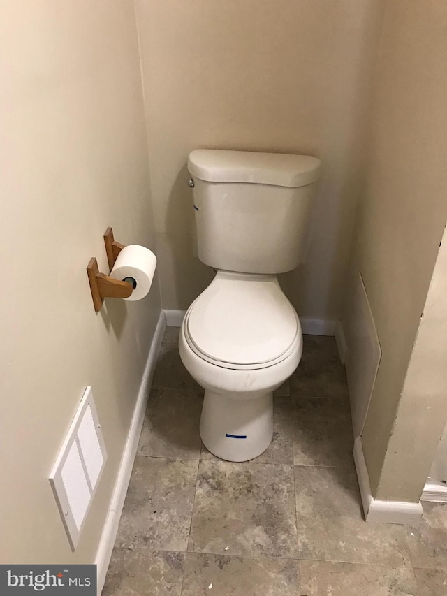 bathroom featuring toilet