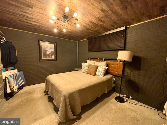 bedroom featuring wood ceiling and brick wall