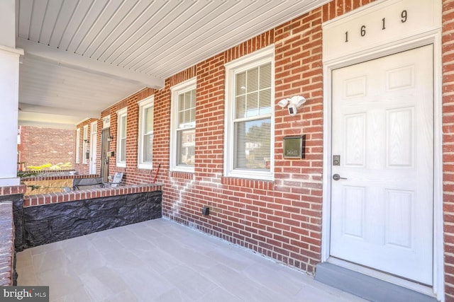 property entrance with a porch