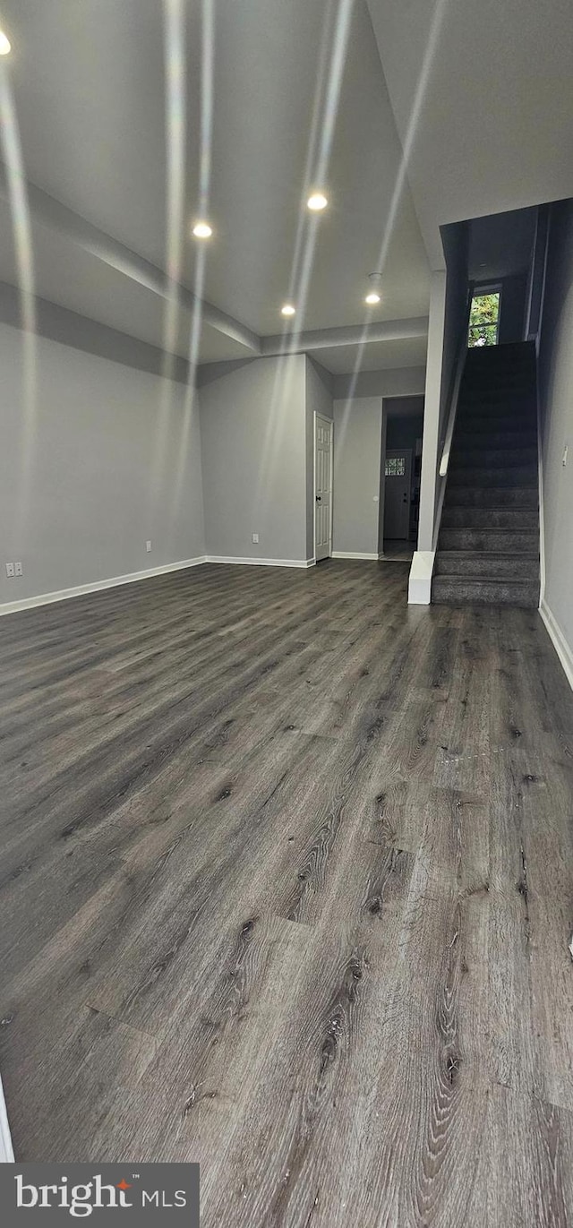 interior space with dark wood-type flooring