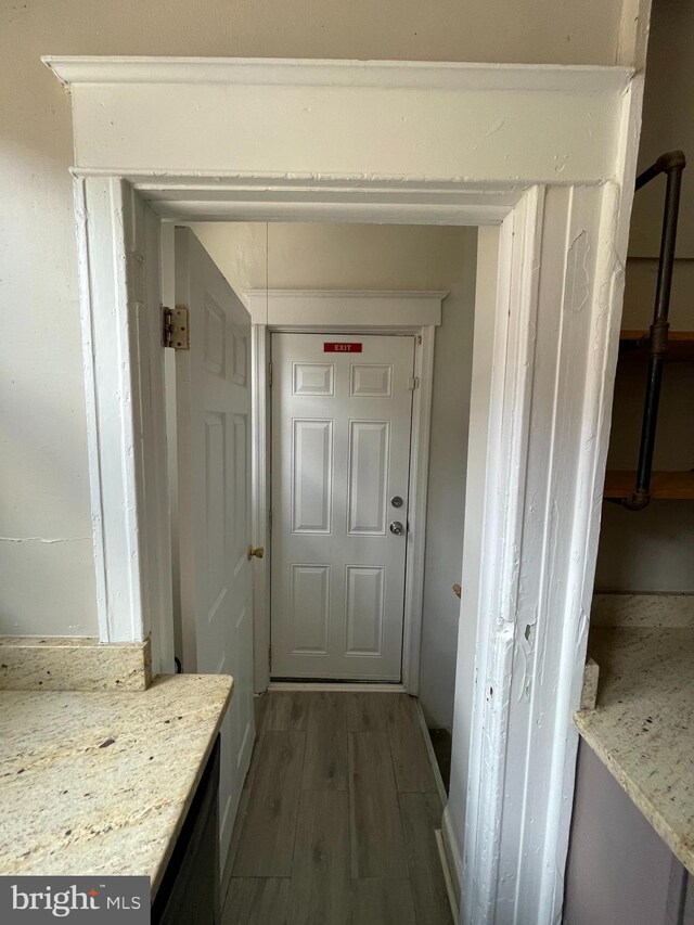 hall featuring dark wood-type flooring