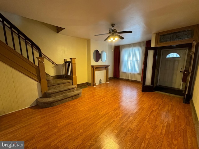 entrance foyer featuring hardwood / wood-style flooring and ceiling fan