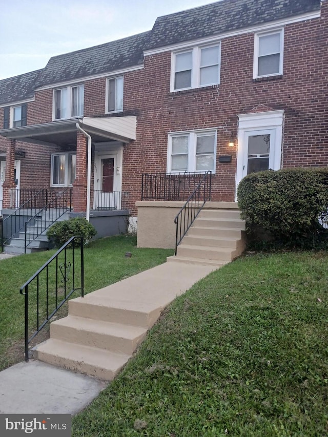 view of property with a front yard