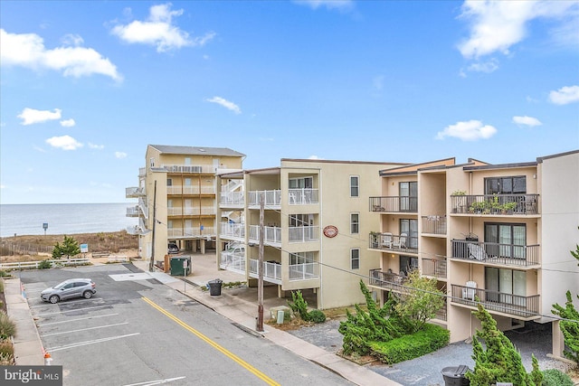 view of property with a water view