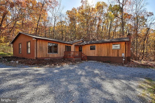 manufactured / mobile home featuring a wooden deck