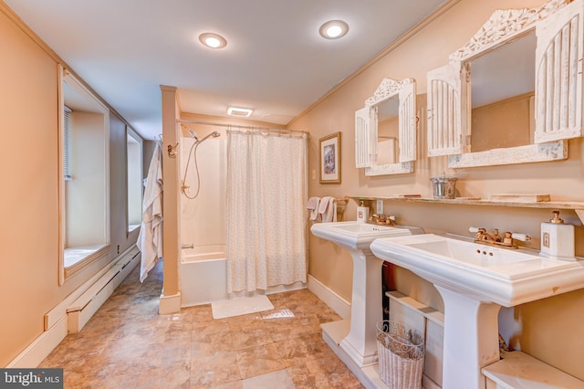 bathroom with ornamental molding, shower / tub combo with curtain, and sink