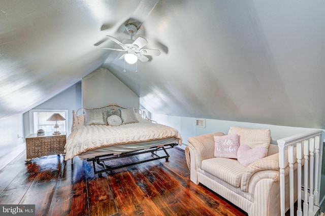 bedroom with vaulted ceiling, dark hardwood / wood-style floors, and ceiling fan