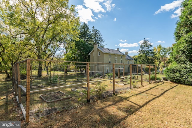 view of yard with a rural view