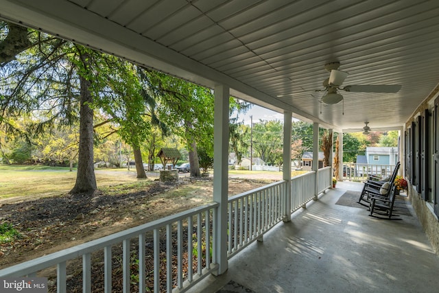 view of patio featuring ceiling fan