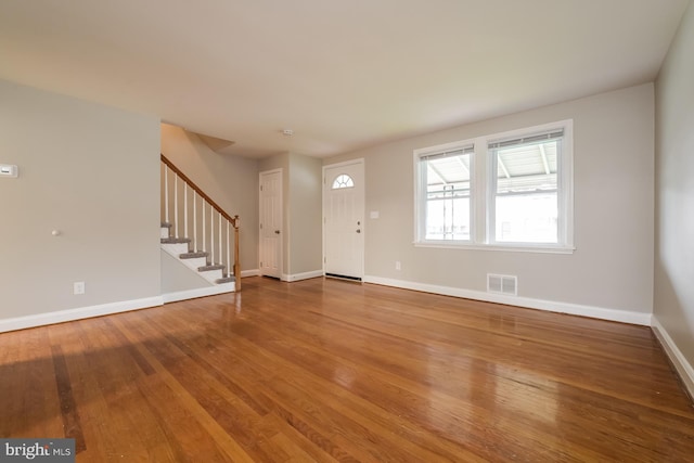 entrance foyer featuring wood-type flooring