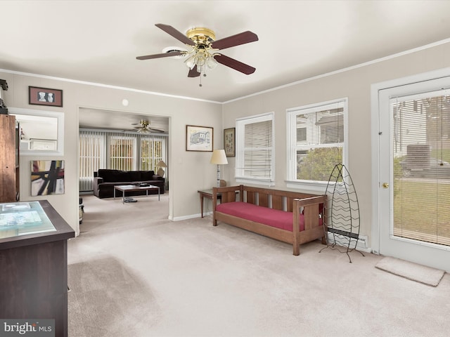carpeted bedroom featuring baseboard heating, baseboards, and ornamental molding