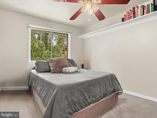 bedroom with light colored carpet and ceiling fan