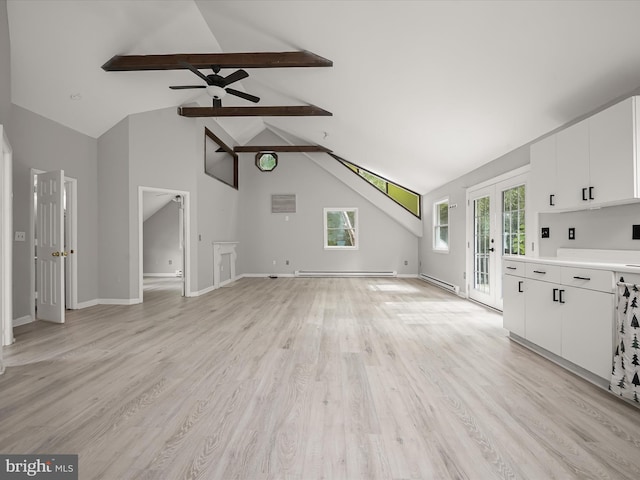 unfurnished living room featuring beam ceiling, high vaulted ceiling, baseboard heating, and light hardwood / wood-style floors