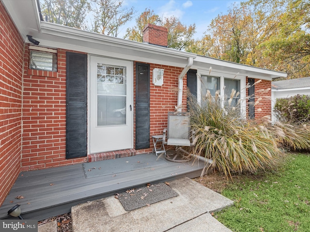 doorway to property featuring a deck