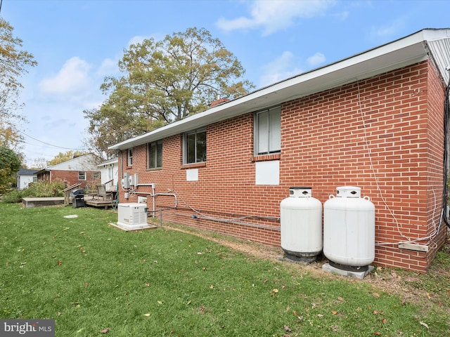 view of home's exterior featuring a lawn