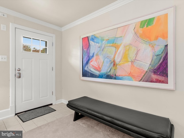 carpeted foyer entrance with ornamental molding