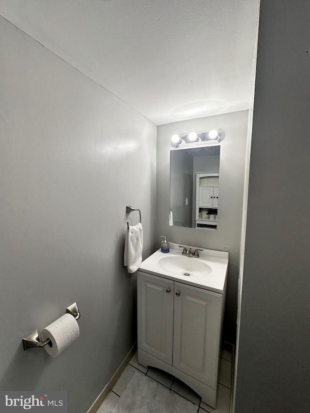 bathroom featuring vanity and tile patterned floors