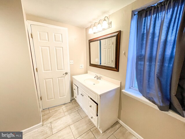 bathroom featuring vanity and tile patterned floors