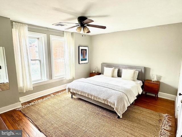 bedroom featuring ceiling fan and hardwood / wood-style floors