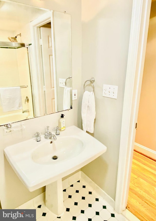 bathroom featuring hardwood / wood-style flooring and sink