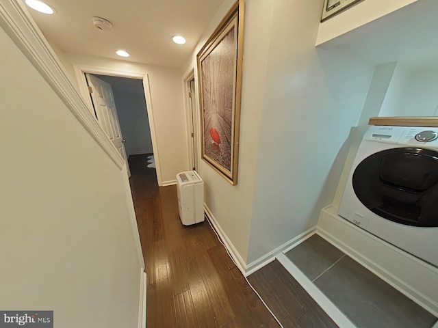 washroom with washer / dryer and dark hardwood / wood-style floors