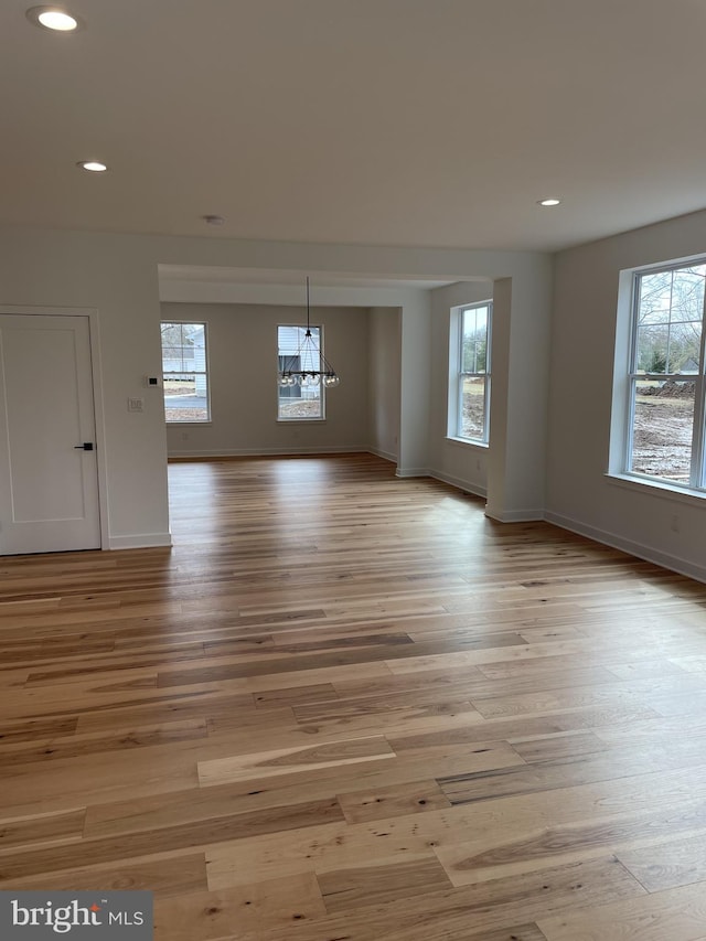 interior space featuring light hardwood / wood-style flooring and a healthy amount of sunlight