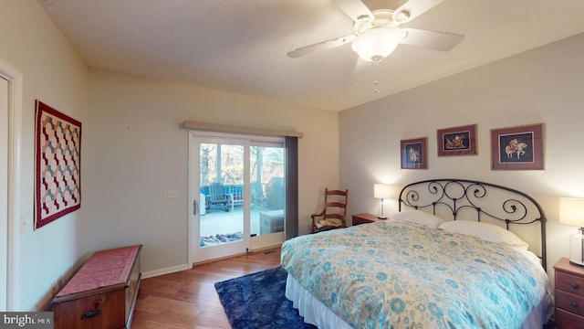 bedroom with access to exterior, ceiling fan, baseboards, and wood finished floors