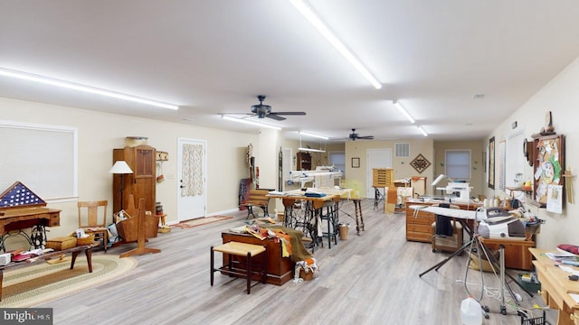 interior space featuring visible vents and light wood-style floors