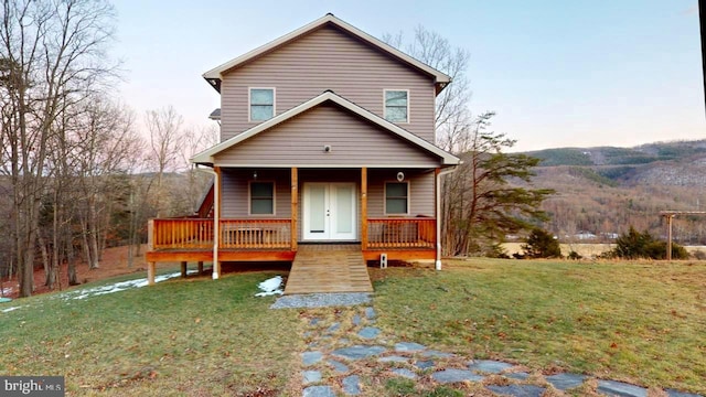 view of front facade with a porch and a front yard