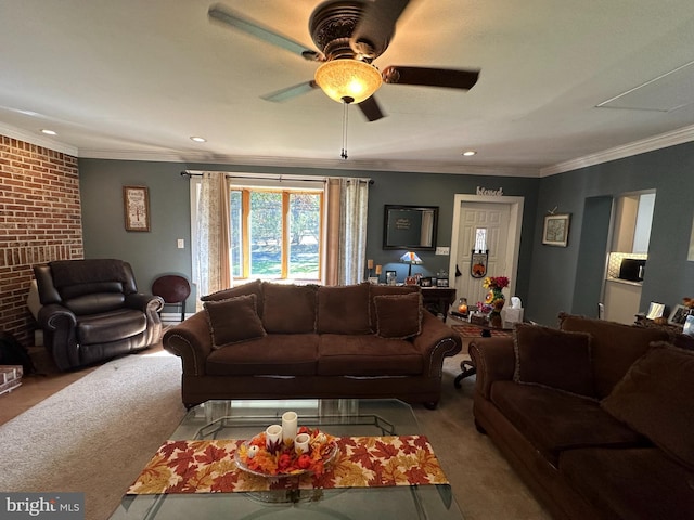 living room featuring ornamental molding, light colored carpet, and ceiling fan