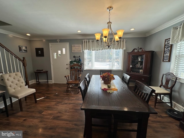 dining room with crown molding, an inviting chandelier, and dark hardwood / wood-style flooring