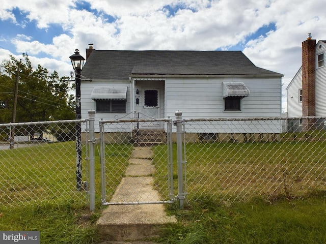 view of outbuilding featuring a lawn