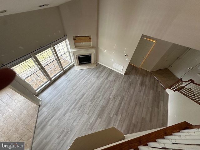 unfurnished living room featuring wood-type flooring