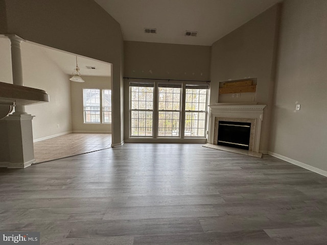 unfurnished living room with hardwood / wood-style floors