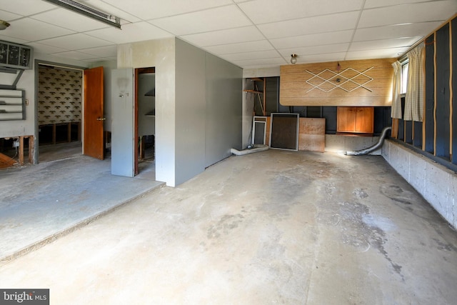 basement featuring a drop ceiling