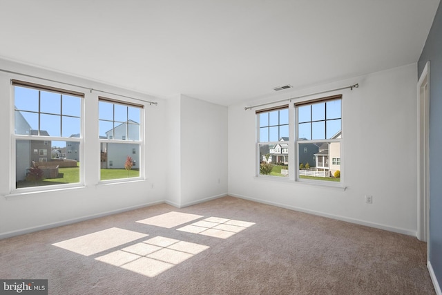 view of carpeted spare room