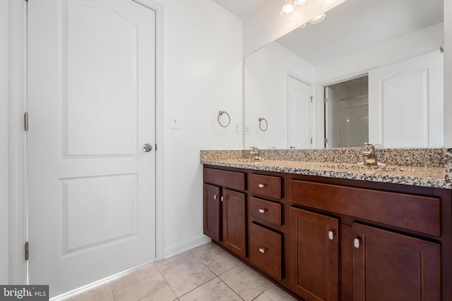 bathroom featuring vanity and tile patterned floors