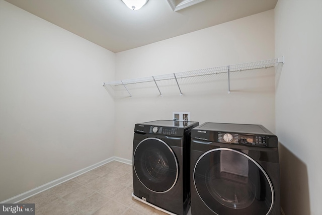 laundry room featuring washer and dryer