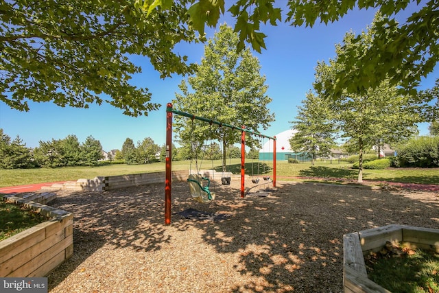 view of jungle gym featuring a yard