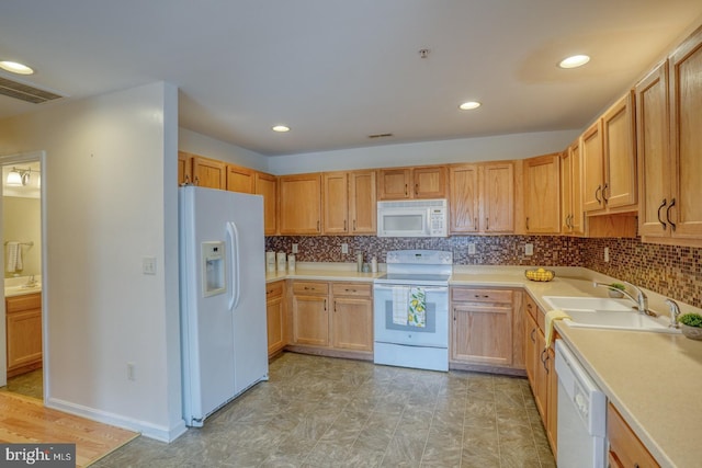 502 Pond Way, Church Hill, MD 21623 - kitchen featuring decorative backsplash, white appliances, recessed lighting, light countertops, and a sink