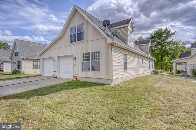 view of front of property featuring a garage and a front yard