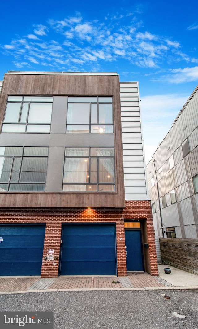 view of front of home featuring a garage