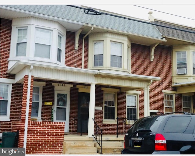 multi unit property featuring covered porch