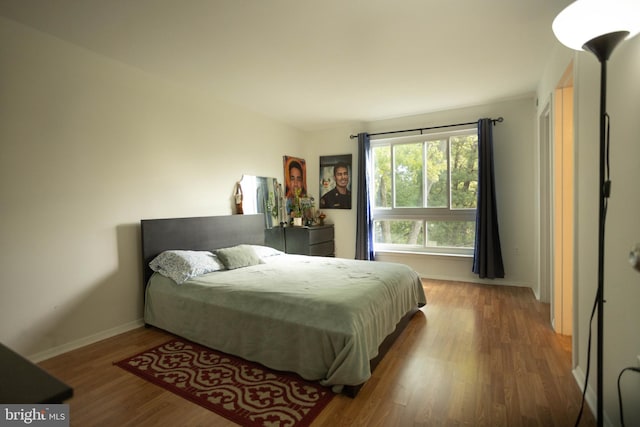 bedroom featuring hardwood / wood-style flooring