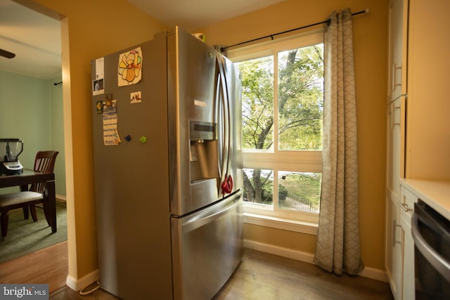 kitchen featuring stainless steel appliances and light wood-type flooring