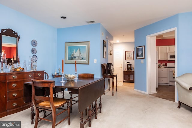 view of carpeted dining room