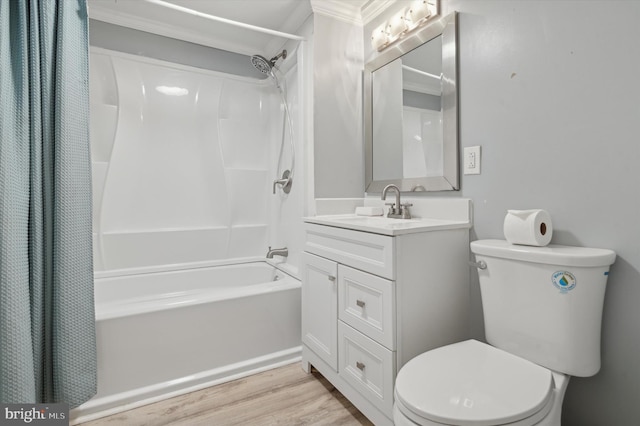 full bathroom with shower / bath combo, crown molding, toilet, vanity, and hardwood / wood-style flooring