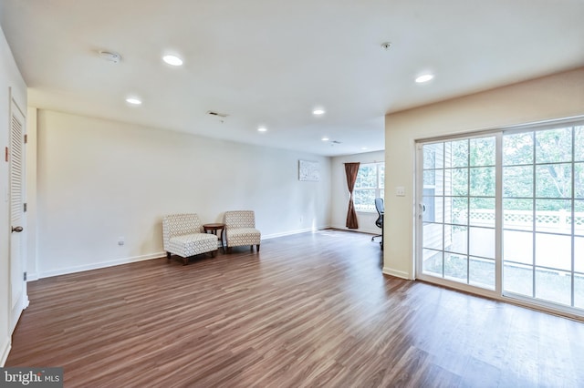 unfurnished room with dark hardwood / wood-style floors